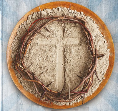 Photo of a crown of thorns in a plate of ashes